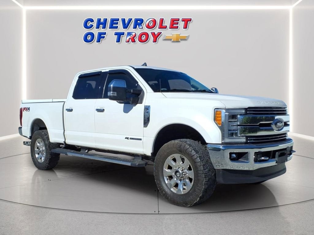 2019 Ford F-250 LARIAT in White — front three-quarter view