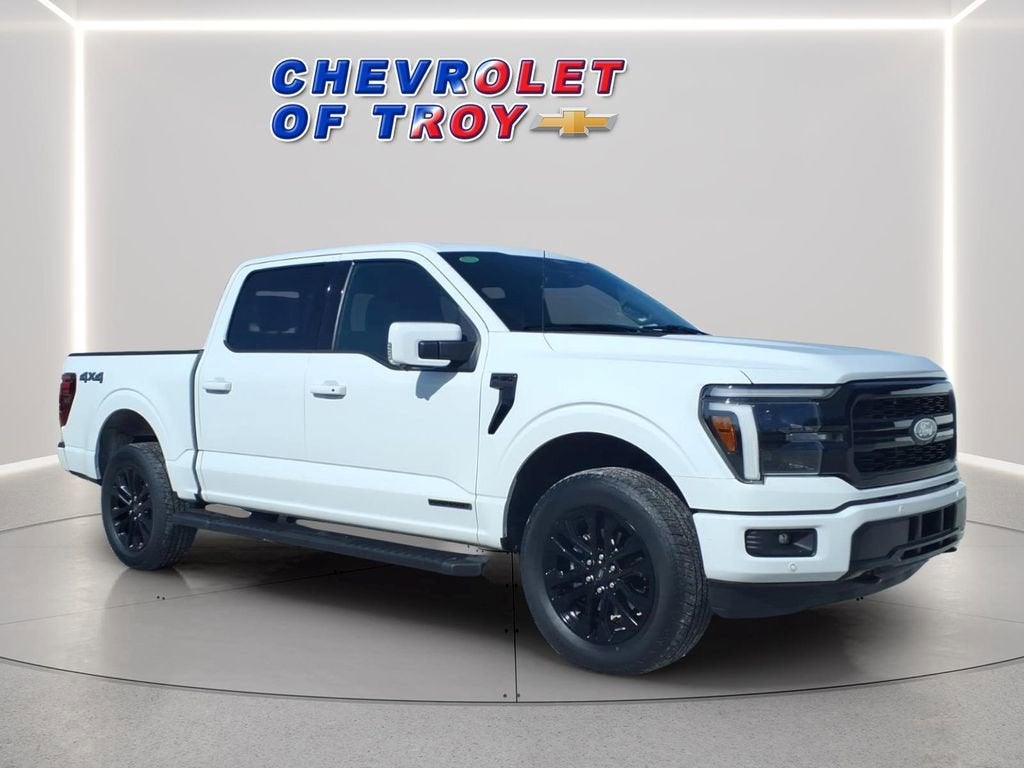 2025 Ford F-150 LARIAT in White — front three-quarter view