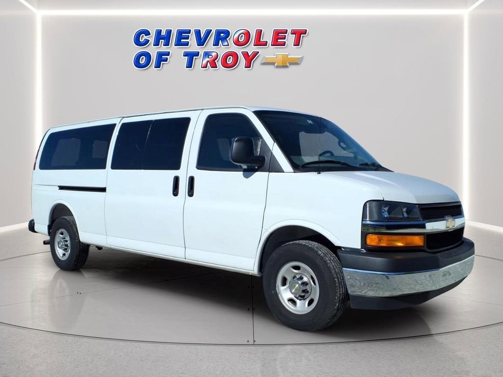2025 Chevrolet Express Passenger 1LT in Summit White — front three-quarter view