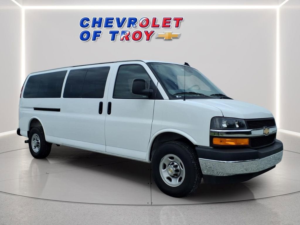 2025 Chevrolet Express Passenger 1LT in Summit White — front three-quarter view