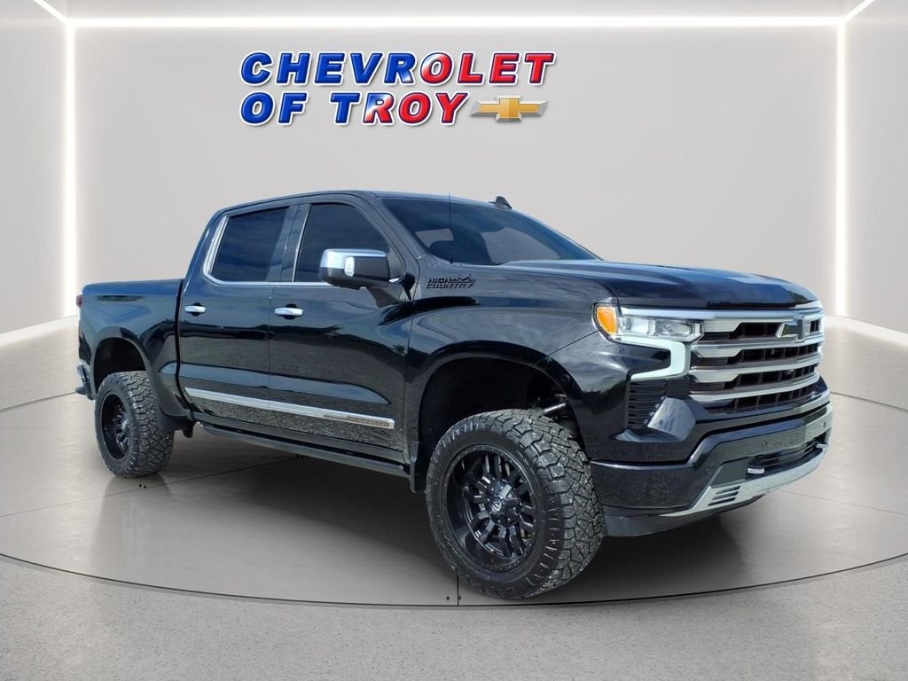 2022 Chevrolet Silverado 1500 High Country in Black — front three-quarter view