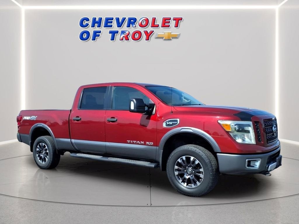 2017 Nissan TITAN XD PRO-4X Gas in Red — front three-quarter view