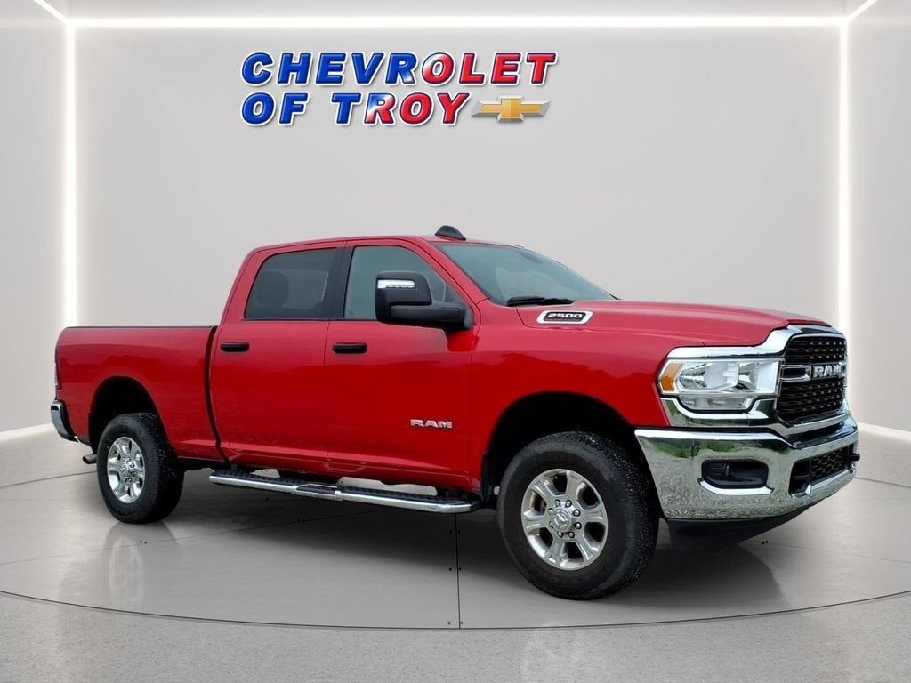 2024 RAM 2500 Big Horn Crew Cab 4x4 6'4" Box in Red — front three-quarter view